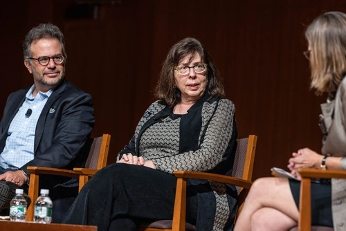 Chris Lehmann, Sarita Brown, and Dean Pam Grossman sitting on a stage for the McGraw Town Hall