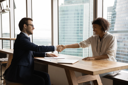 Two people handshaking