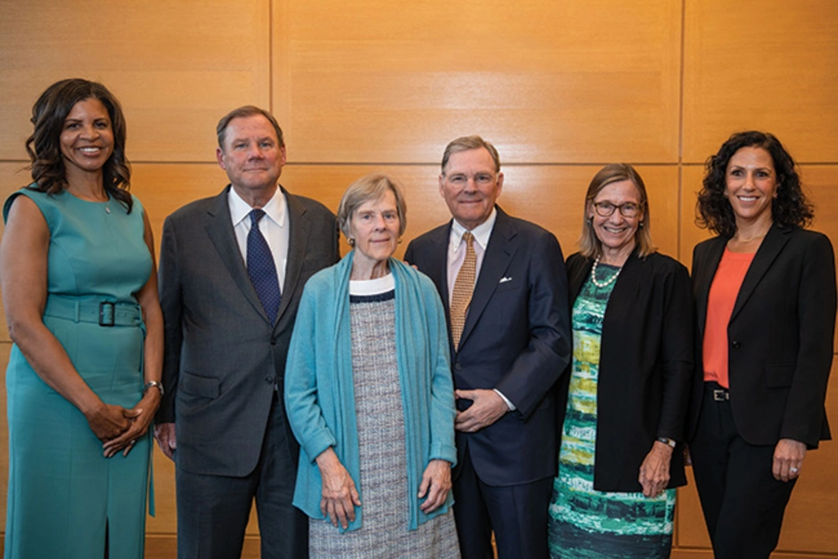 Photo of people posing for a photo during the launch event from left to right, inaugural Director Cheryl Logan; Robert, Suzanne, and Harold "Terry" McGraw III; former Dean Pam Grossman; and Dean Katharine Strunk.