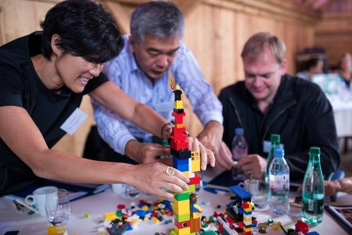Three participants take part in an ERFIP workshop.