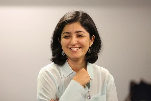 Ameena Ghaffar-Kucher in a classroom.