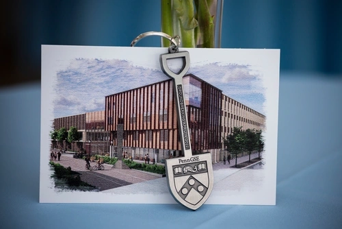 Conceptual design image of Penn GSE’s renovated building containing tall panels and numerous windows.