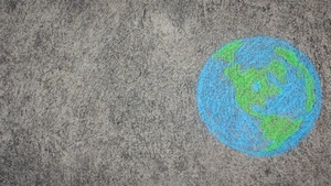 chalk drawing of a globe on cement