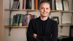 Michael Gottfried standing in his office