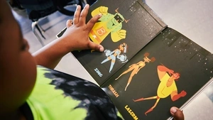 child reading a picture book
