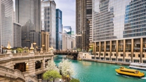 Image of a city ovelooking tall buildings and a river