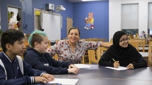 Teacher with three students